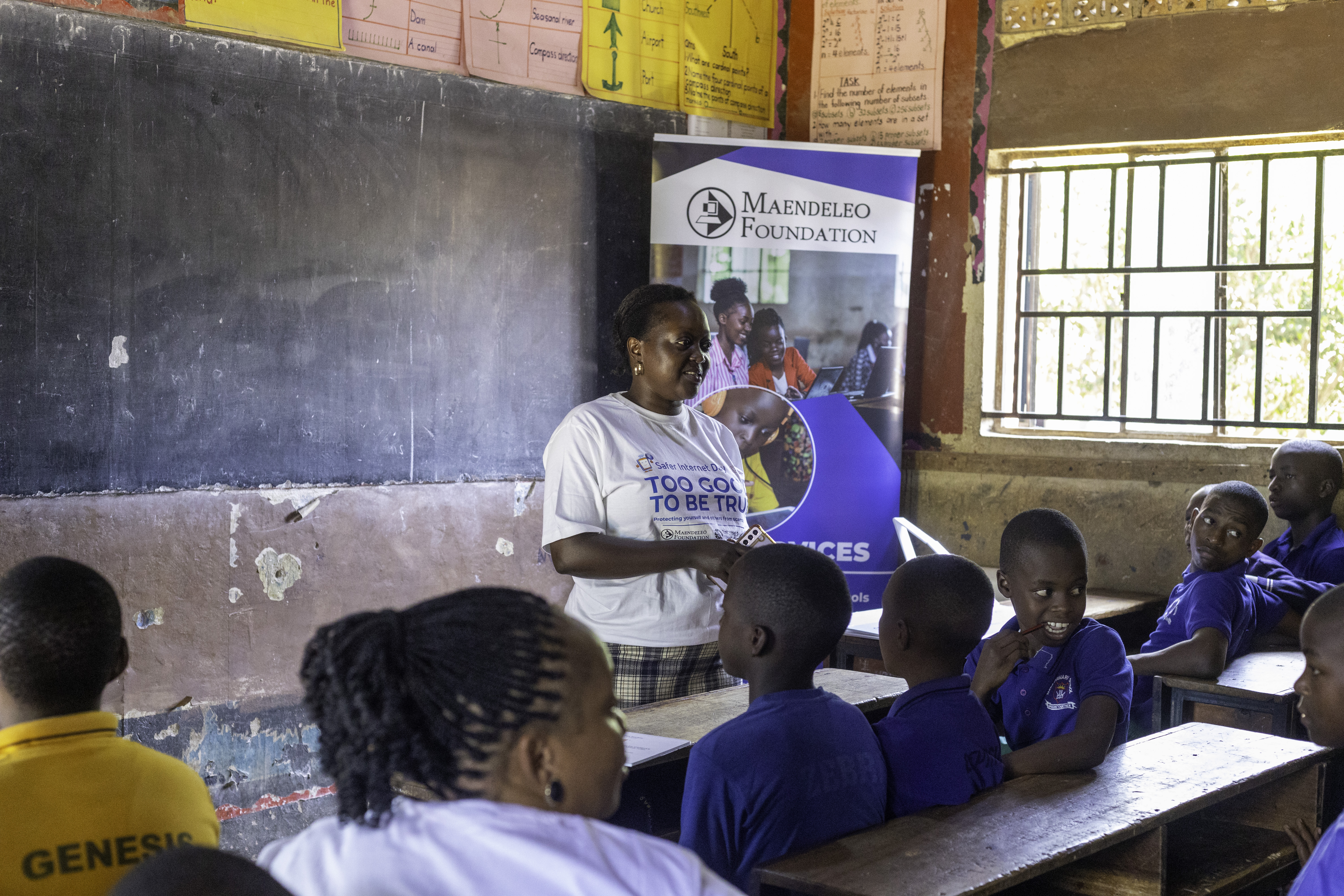 Students learning digital skills in a community center